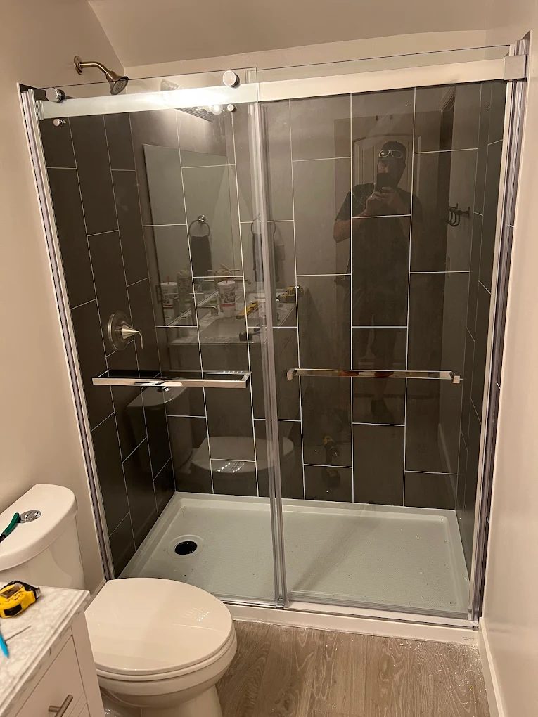 Finished bathroom remodel with tiled walk-in shower