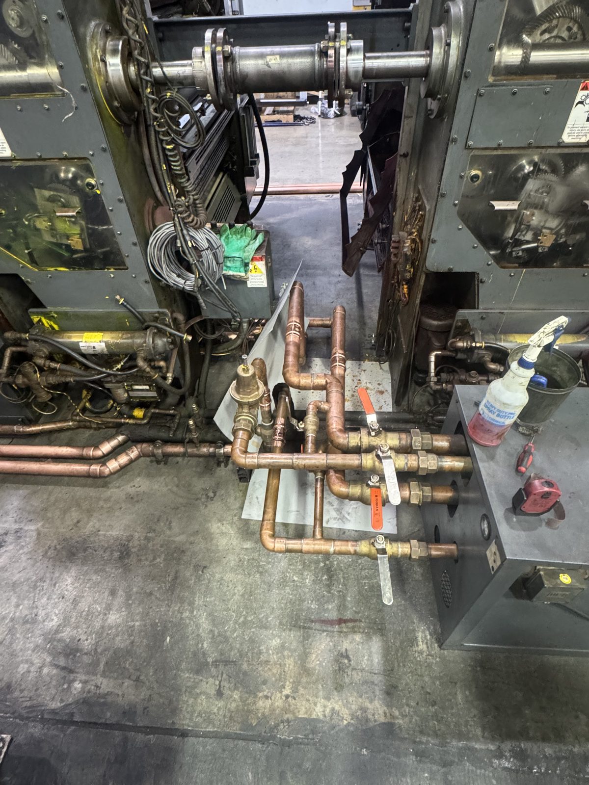 Copper piping service work in a commercial boiler room