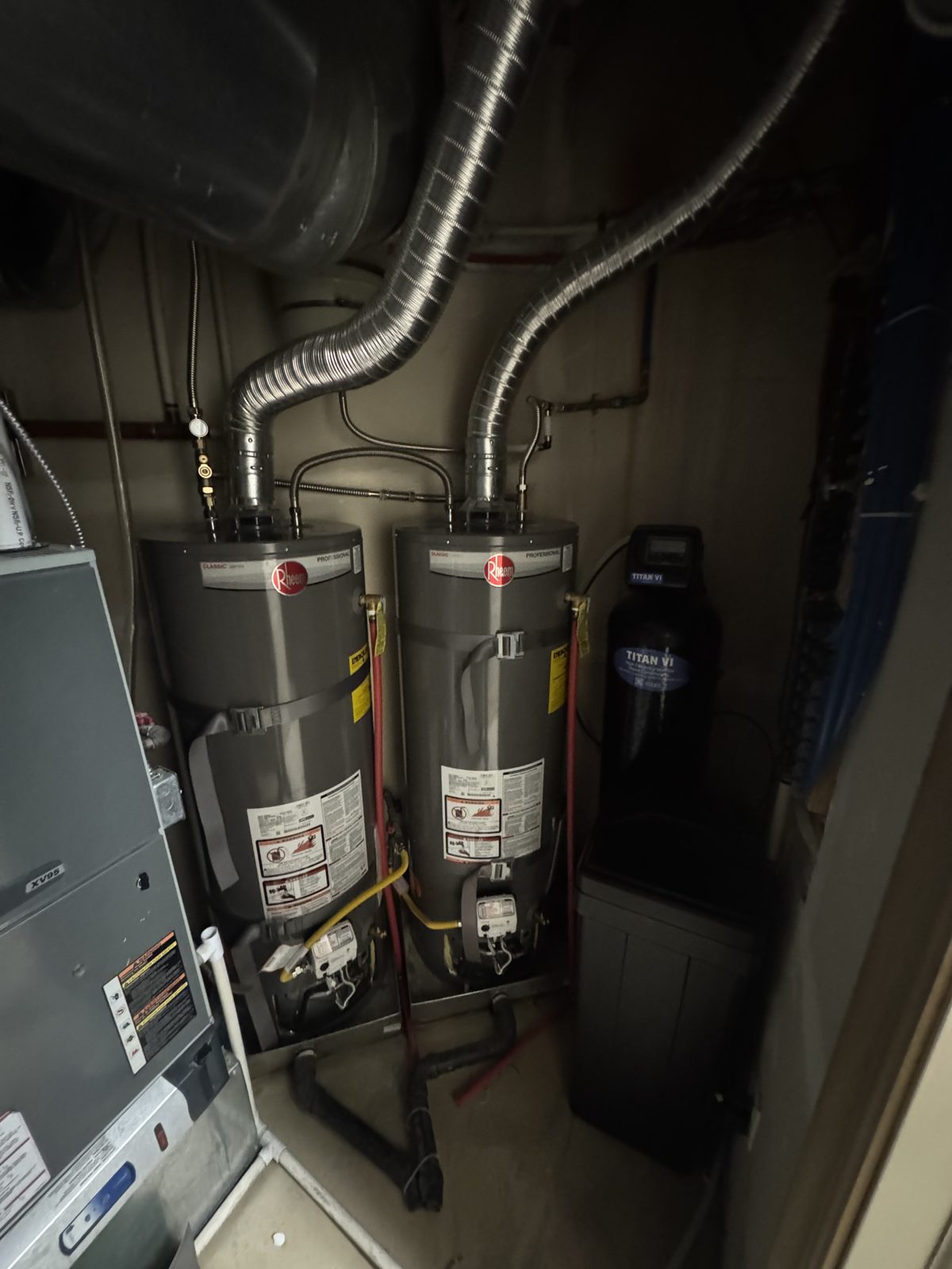 Two water heaters and a water softener serving a large Utah County home